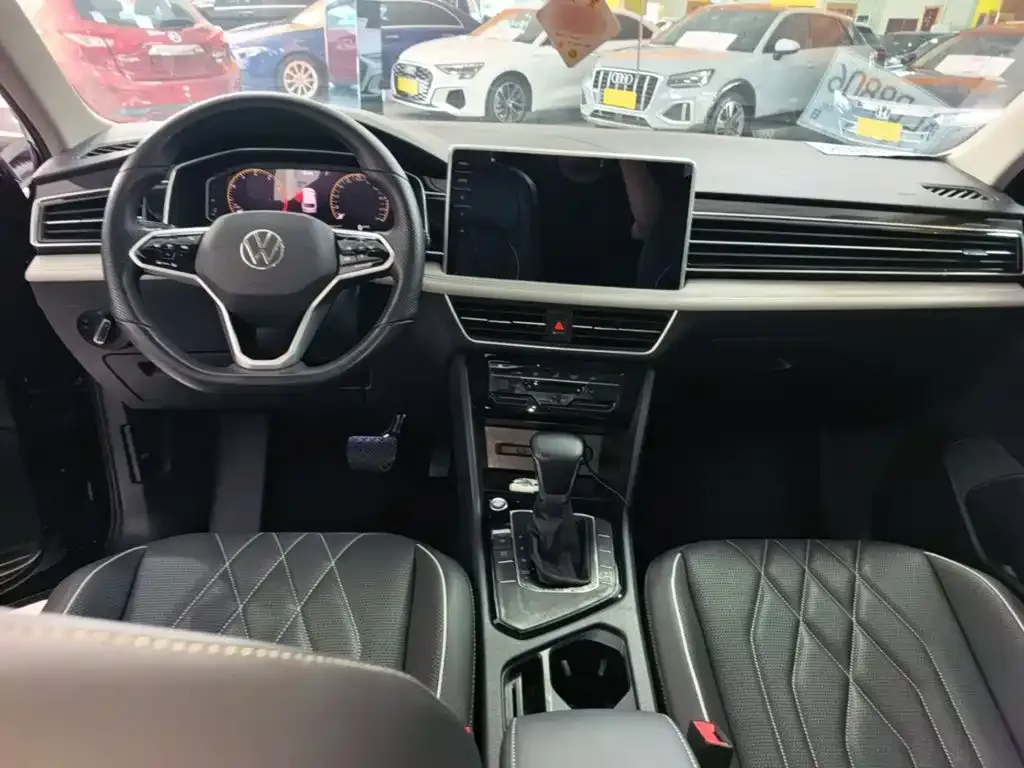Volkswagen Tiguan L — фото 2