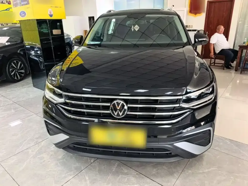 Volkswagen Tiguan L — фото 5