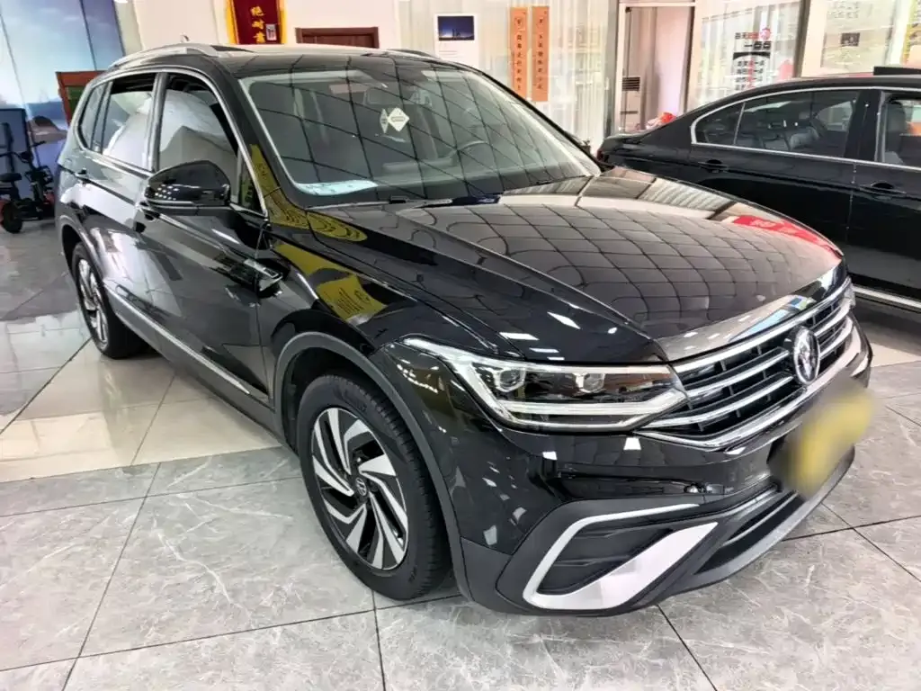 Volkswagen Tiguan L — фото 8