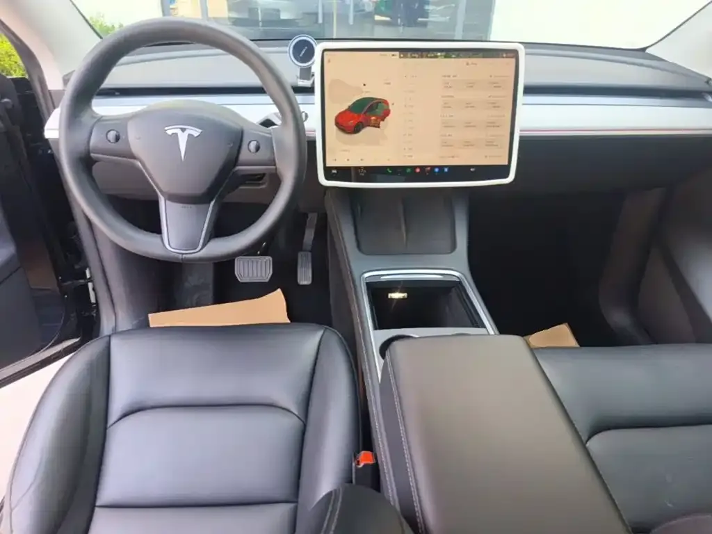Tesla Model Y — фото 6