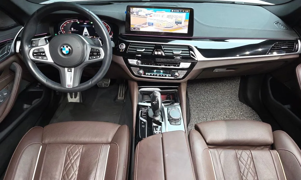 BMW 5-Series — фото 10