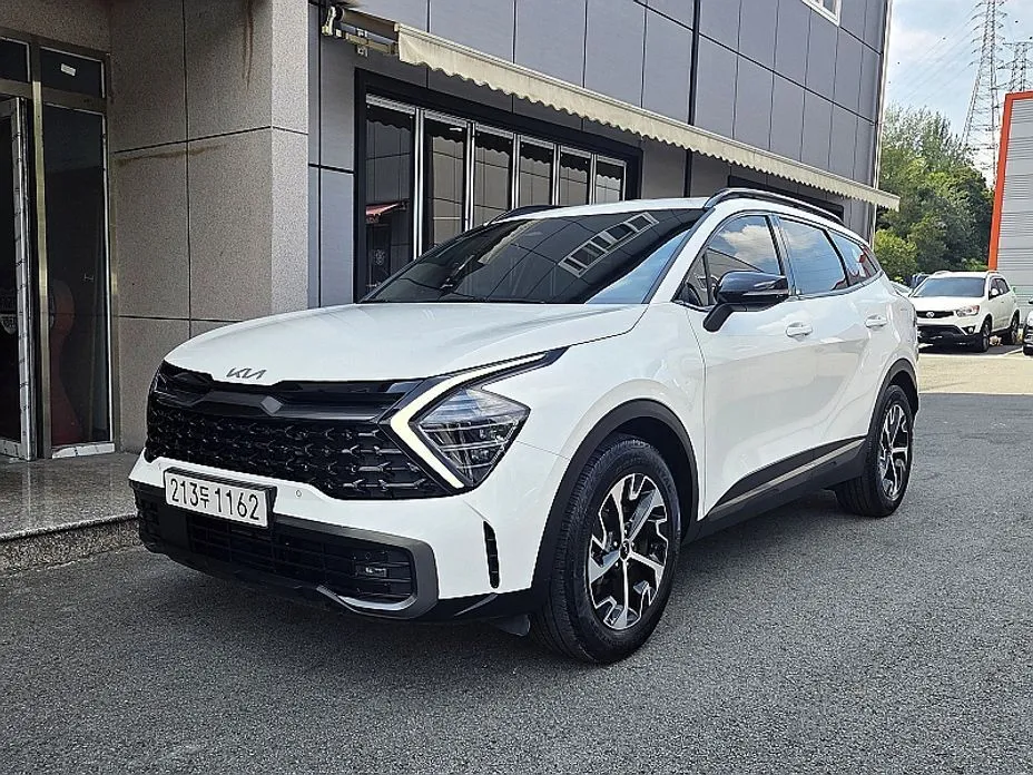 Kia Sportage — фото 1