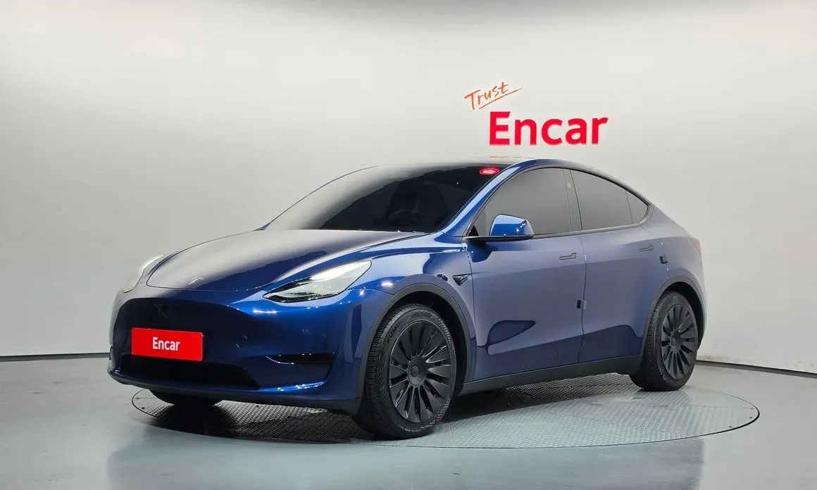 Tesla Model Y — фото 1