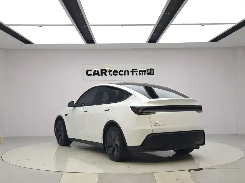 Tesla Model Y — фото 5