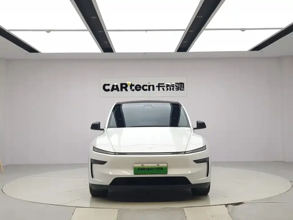 Tesla Model Y — фото 6