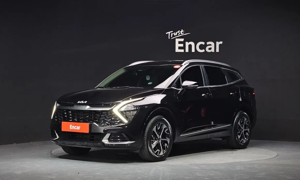 Kia Sportage — фото 1