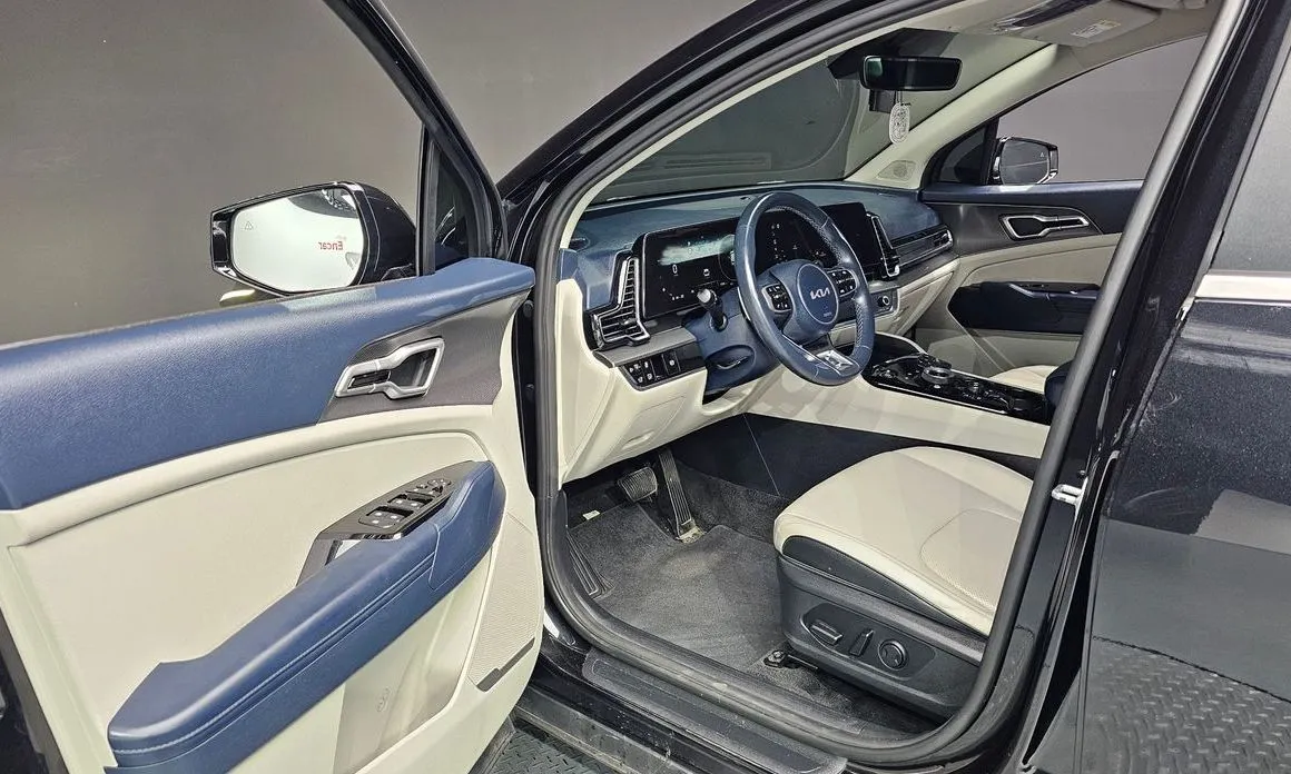Kia Sportage — фото 9