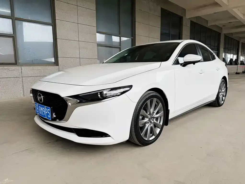 Mazda 3 Axela — фото 1