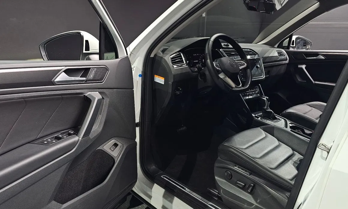 Volkswagen Tiguan — фото 9