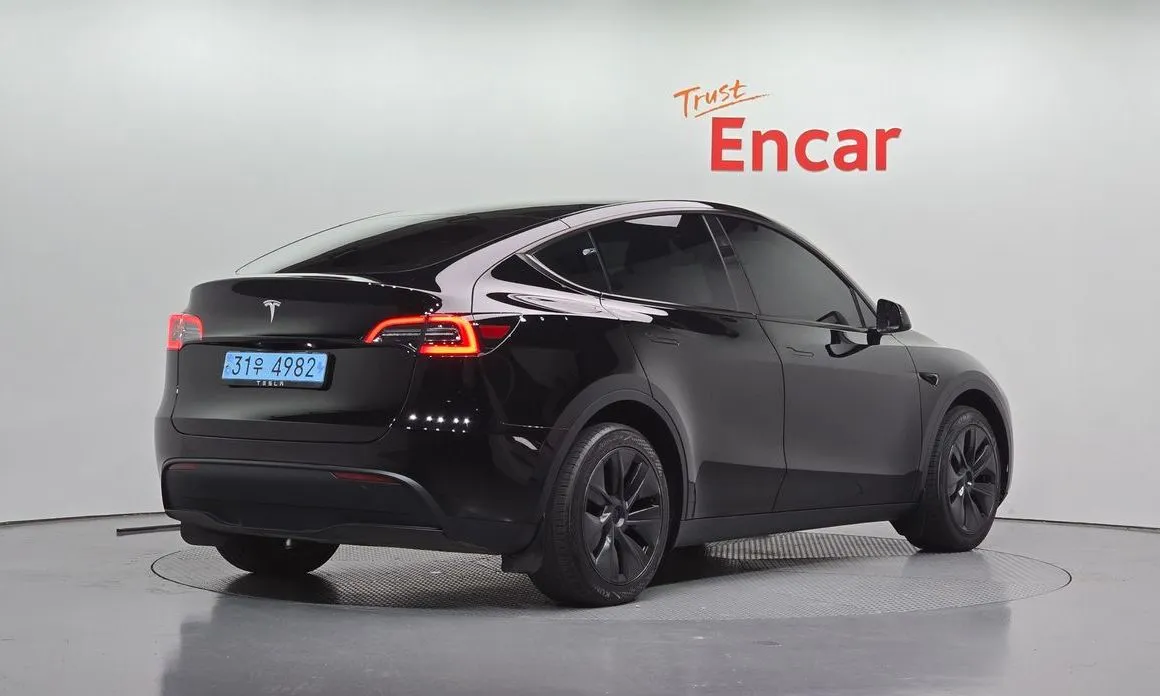 Tesla Model Y — фото 5