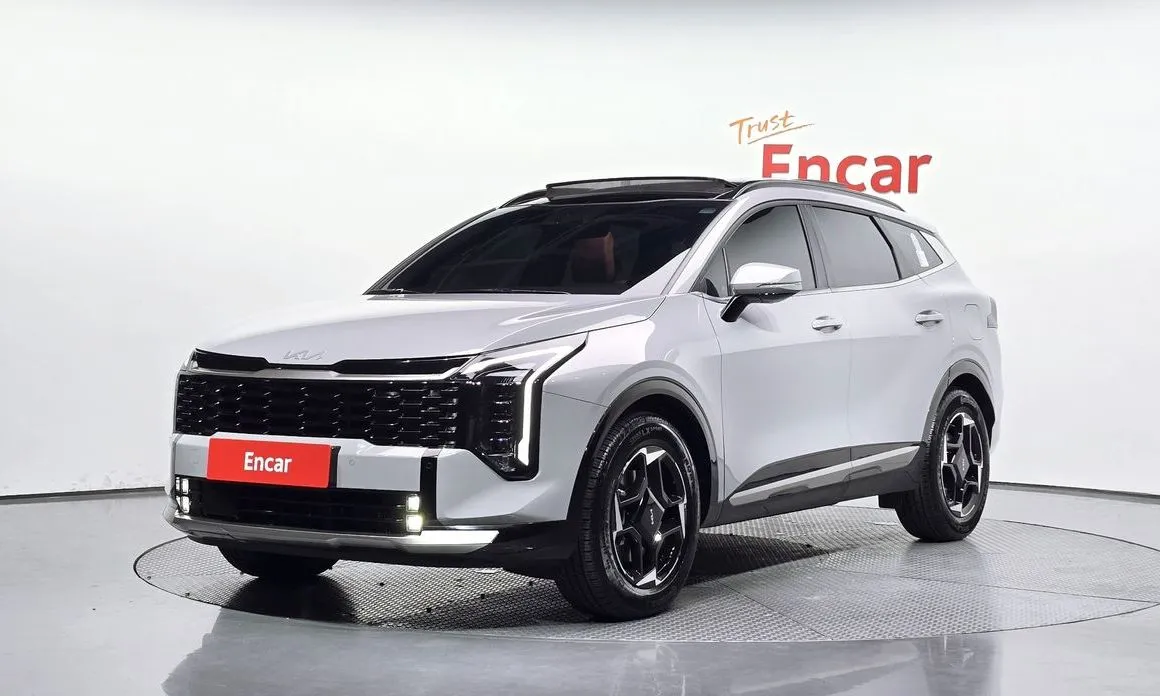 Kia Sportage — фото 1
