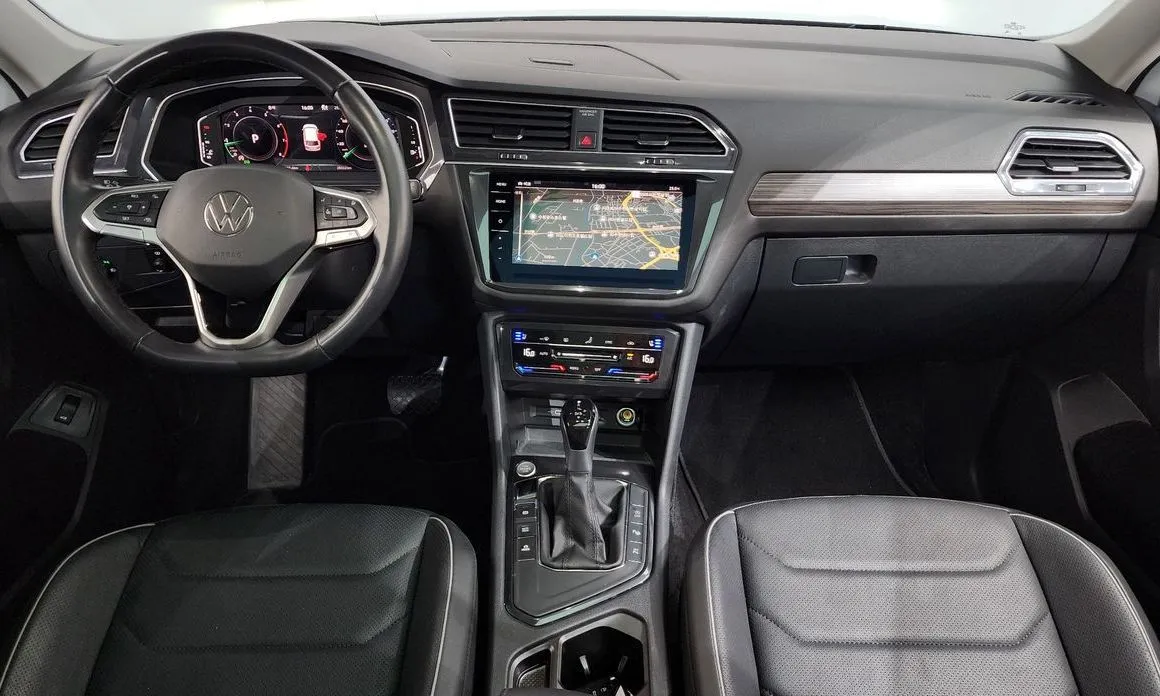 Volkswagen Tiguan — фото 9