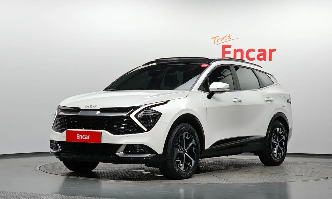 Kia Sportage — фото 1
