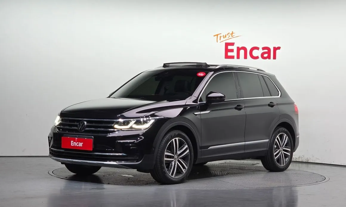 Volkswagen Tiguan — фото 1