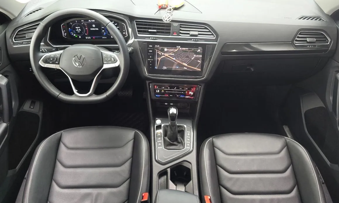 Volkswagen Tiguan — фото 9