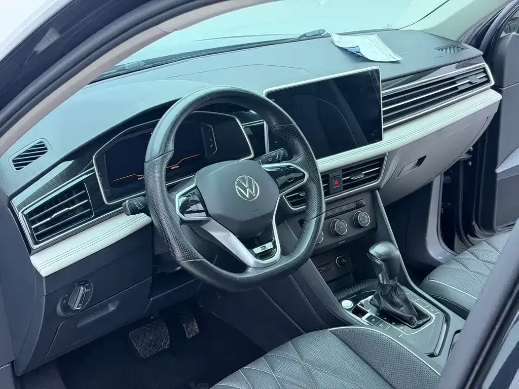 Volkswagen Tiguan L — фото 10