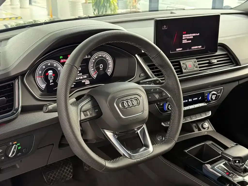 Audi Q5L — фото 7