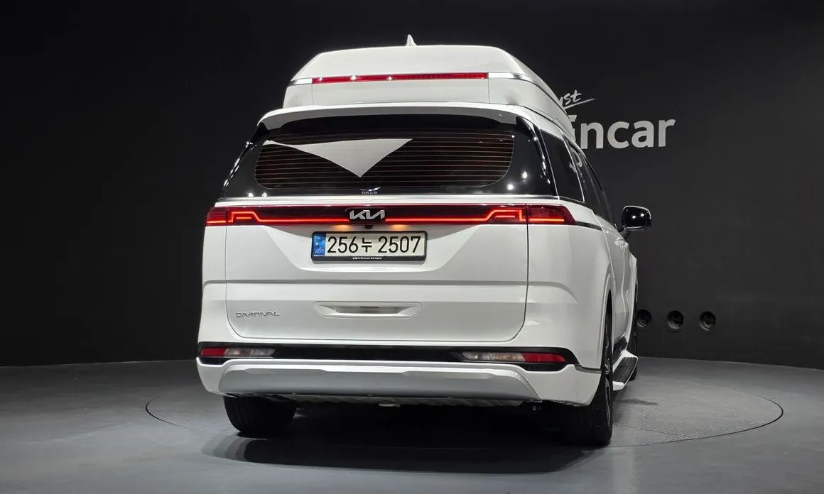 Kia Carnival — фото 4