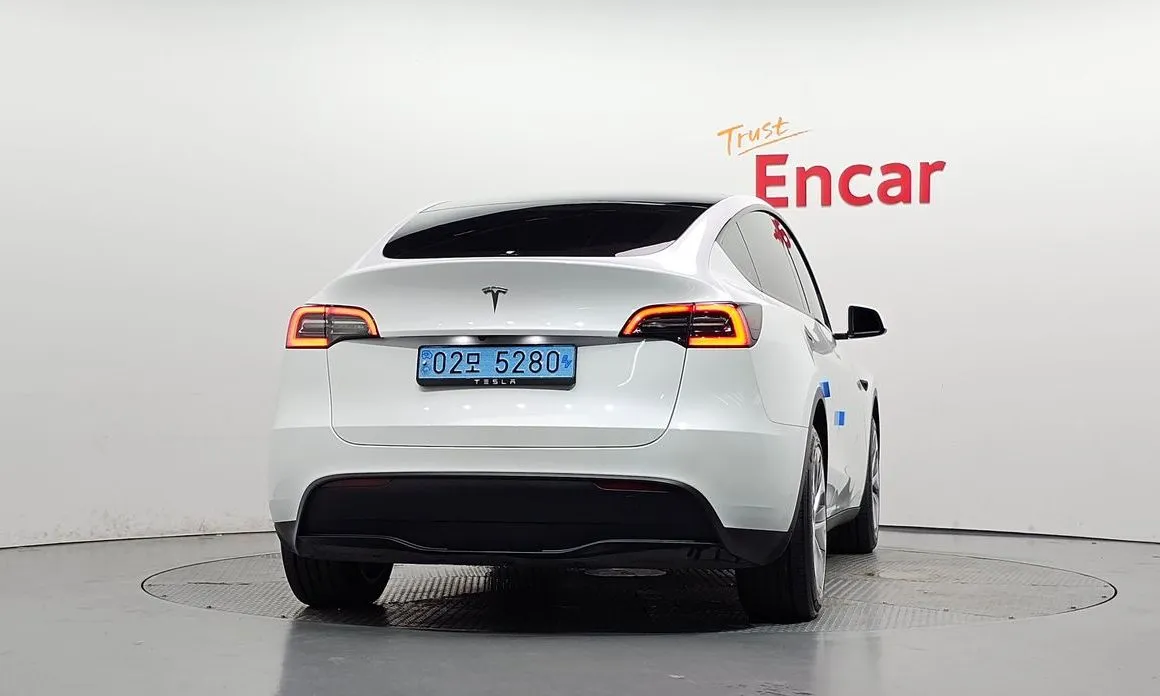 Tesla Model Y — фото 6