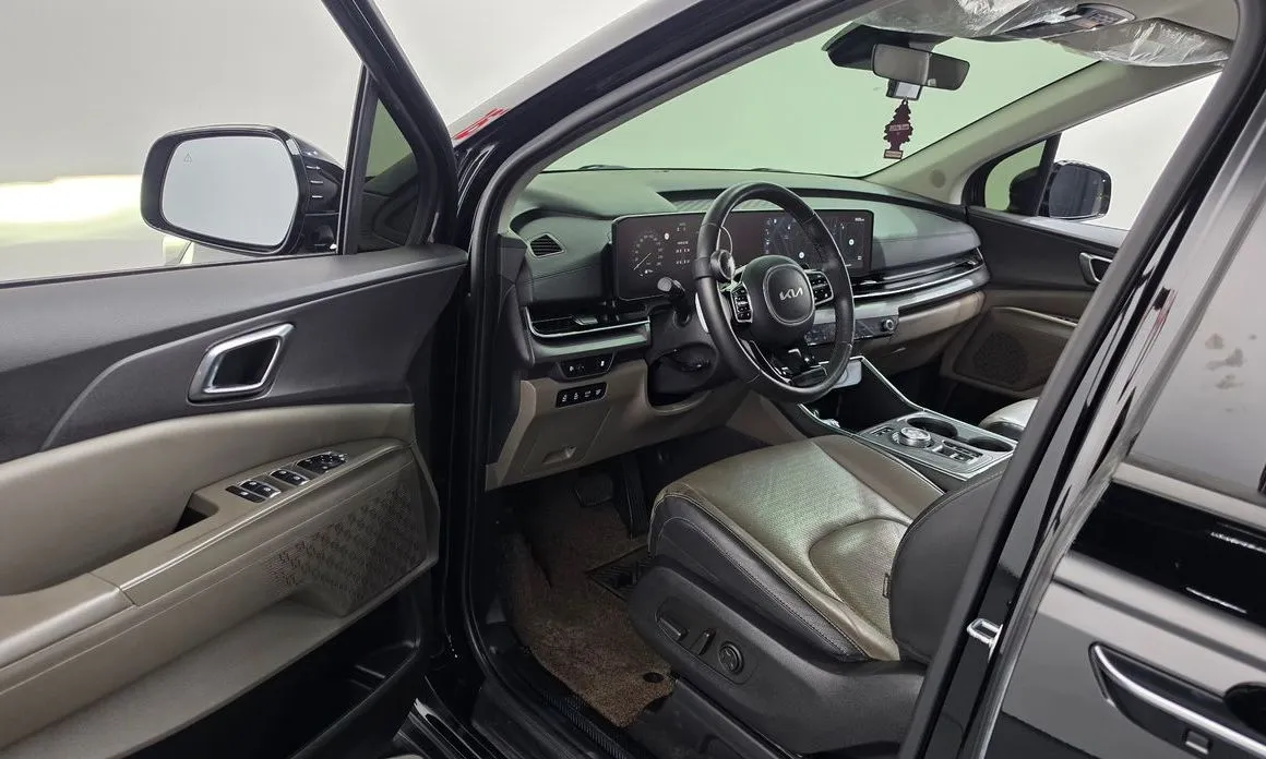 Kia Carnival — фото 10