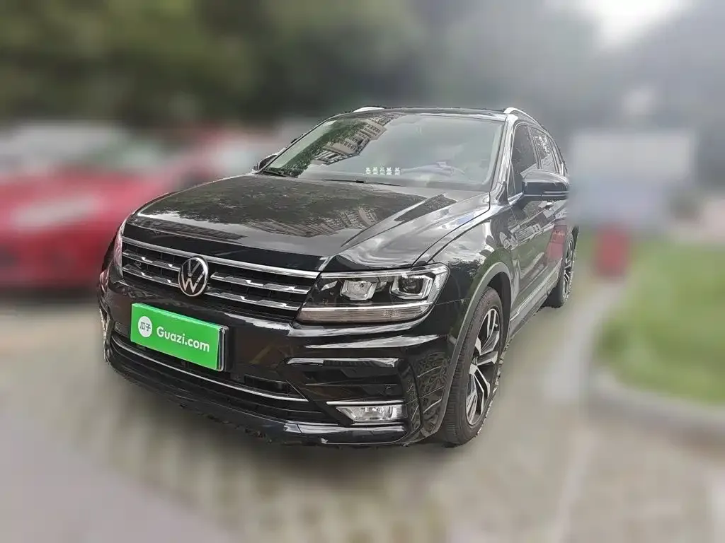 Volkswagen Tiguan L — фото 1