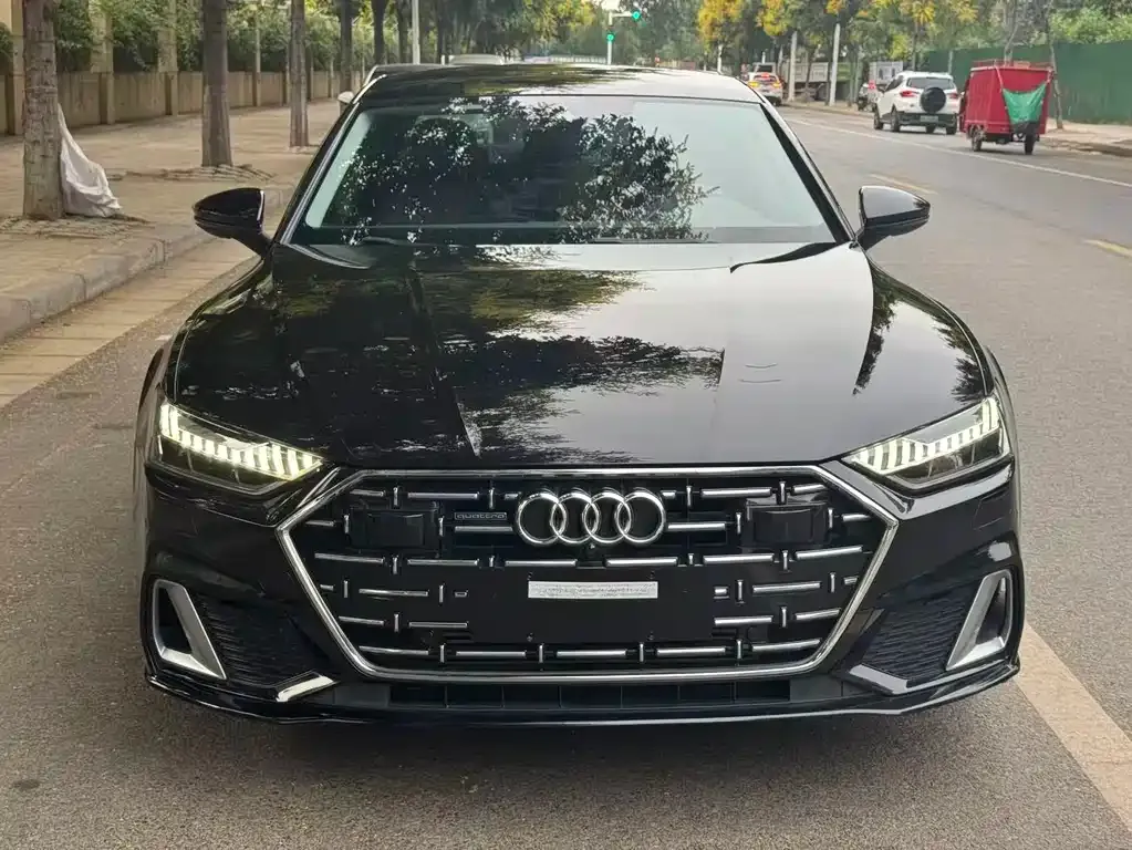 Audi A7L — фото 7