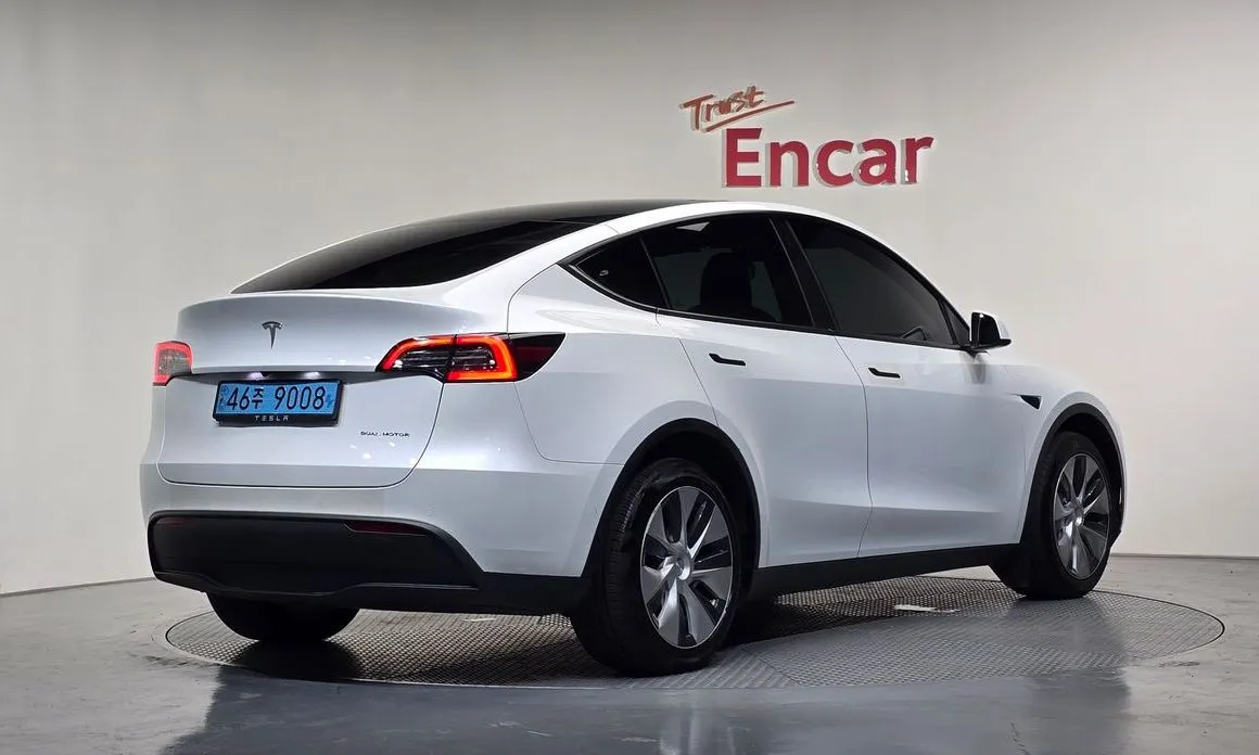 Tesla Model Y — фото 7