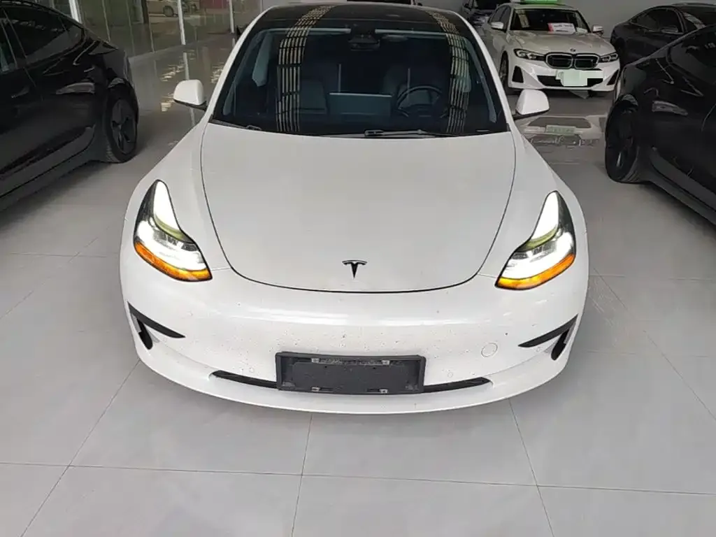 Tesla Model 3 — фото 7