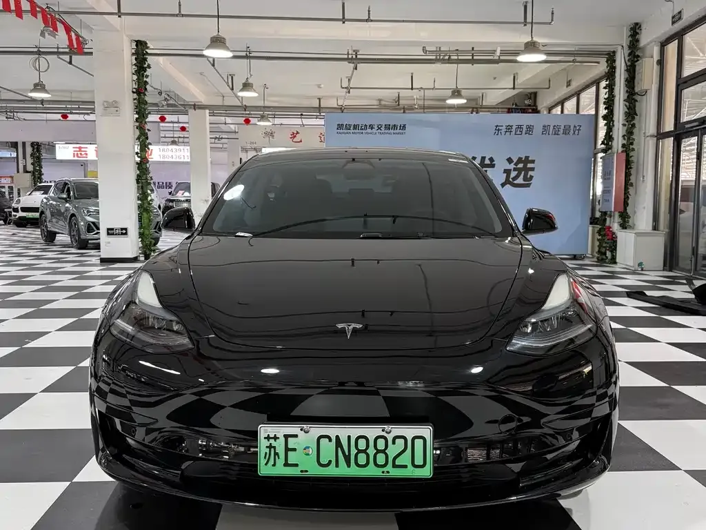 Tesla Model 3 — фото 10