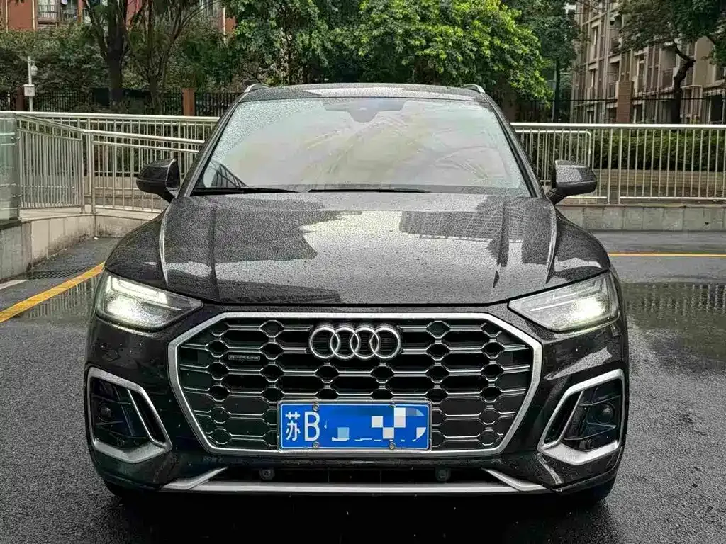 Audi Q5L — фото 10