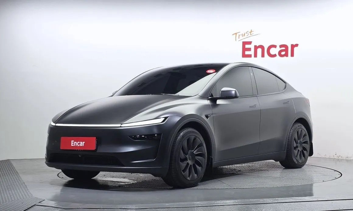 Tesla Model Y — фото 1