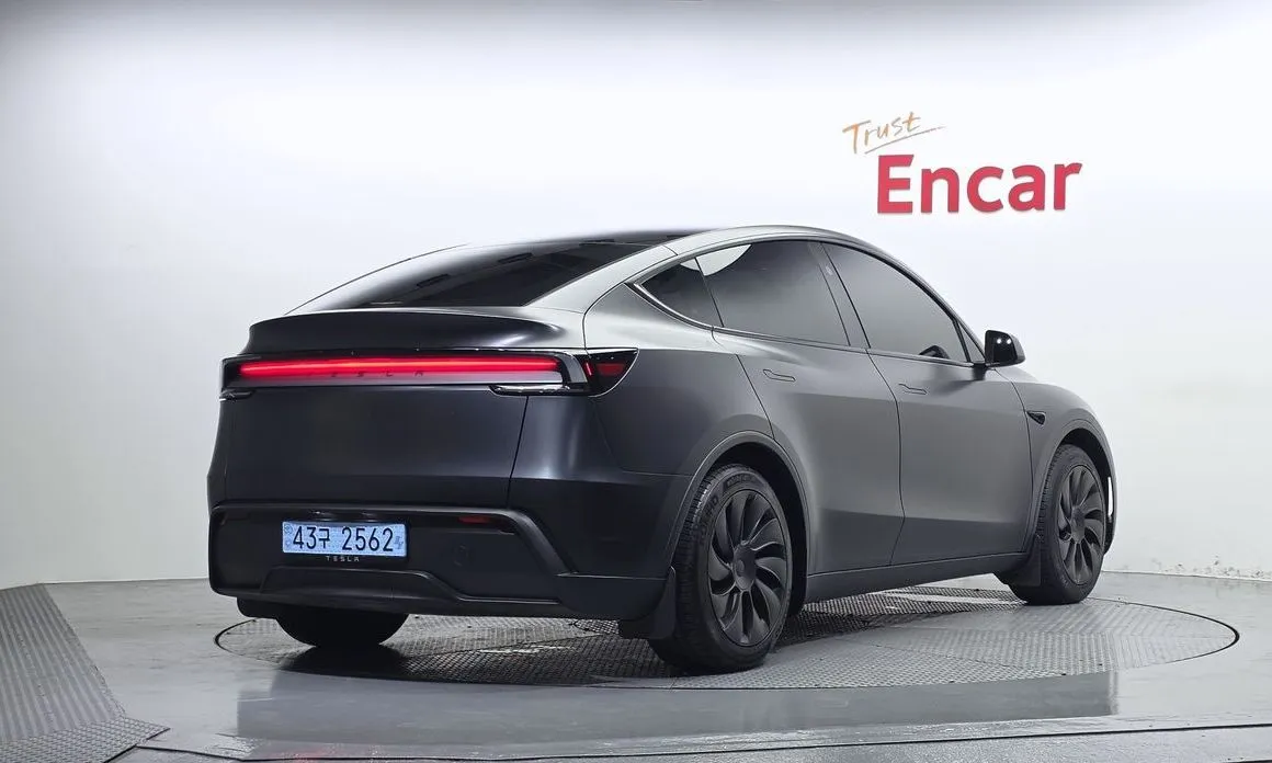 Tesla Model Y — фото 6