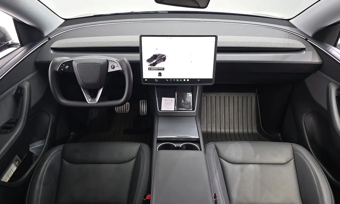 Tesla Model Y — фото 10