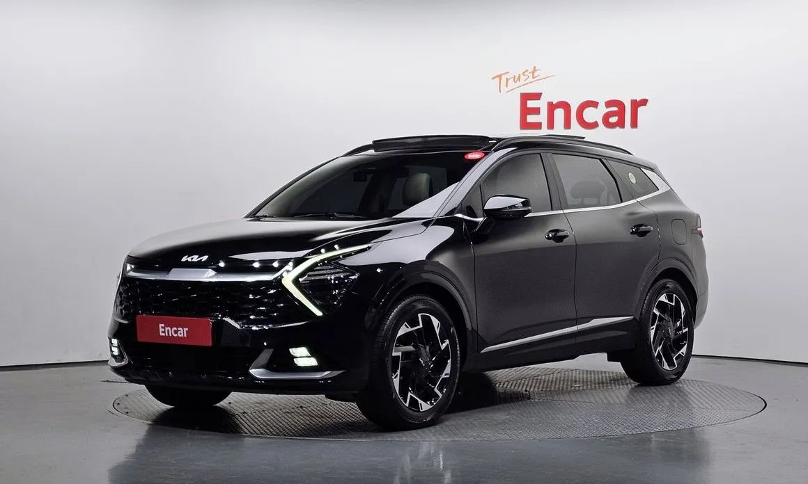 Kia Sportage — фото 1