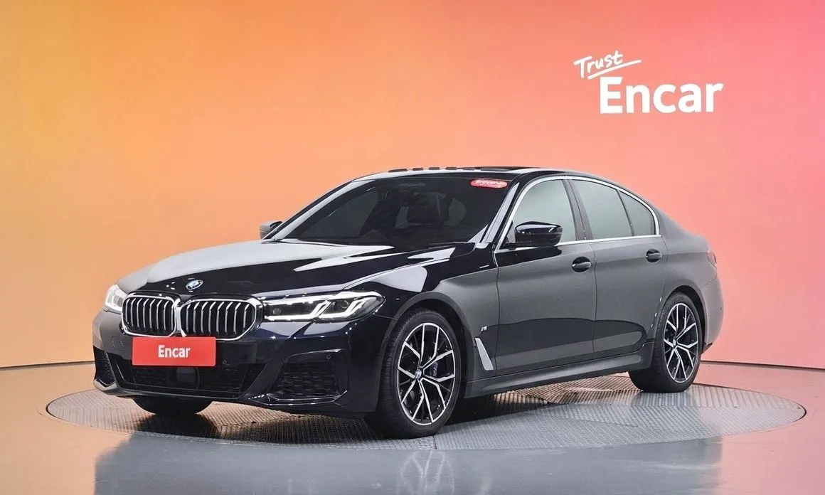 BMW 5-Series — фото 1