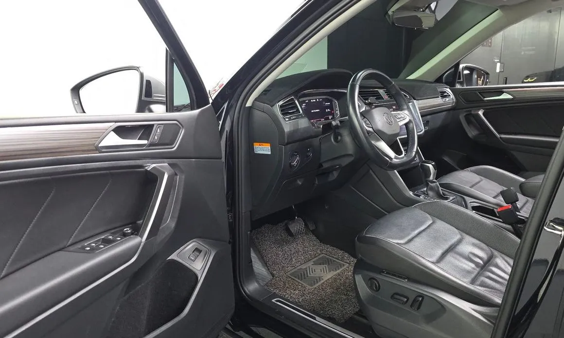 Volkswagen Tiguan — фото 8