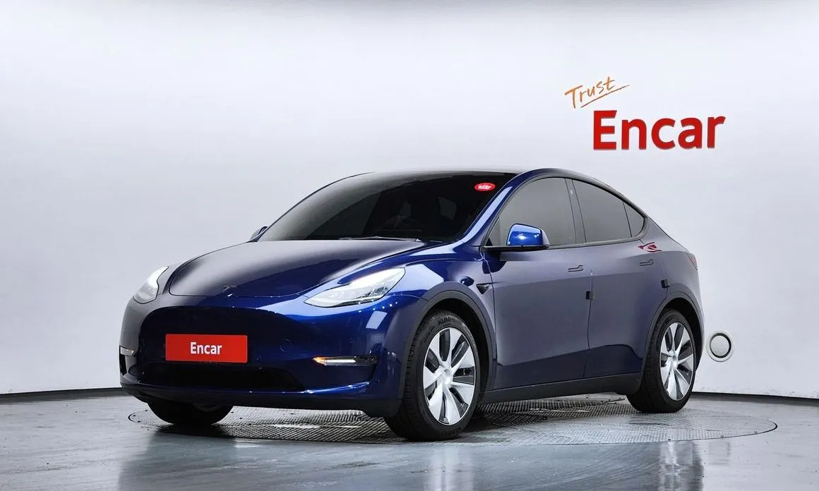 Tesla Model Y — фото 1