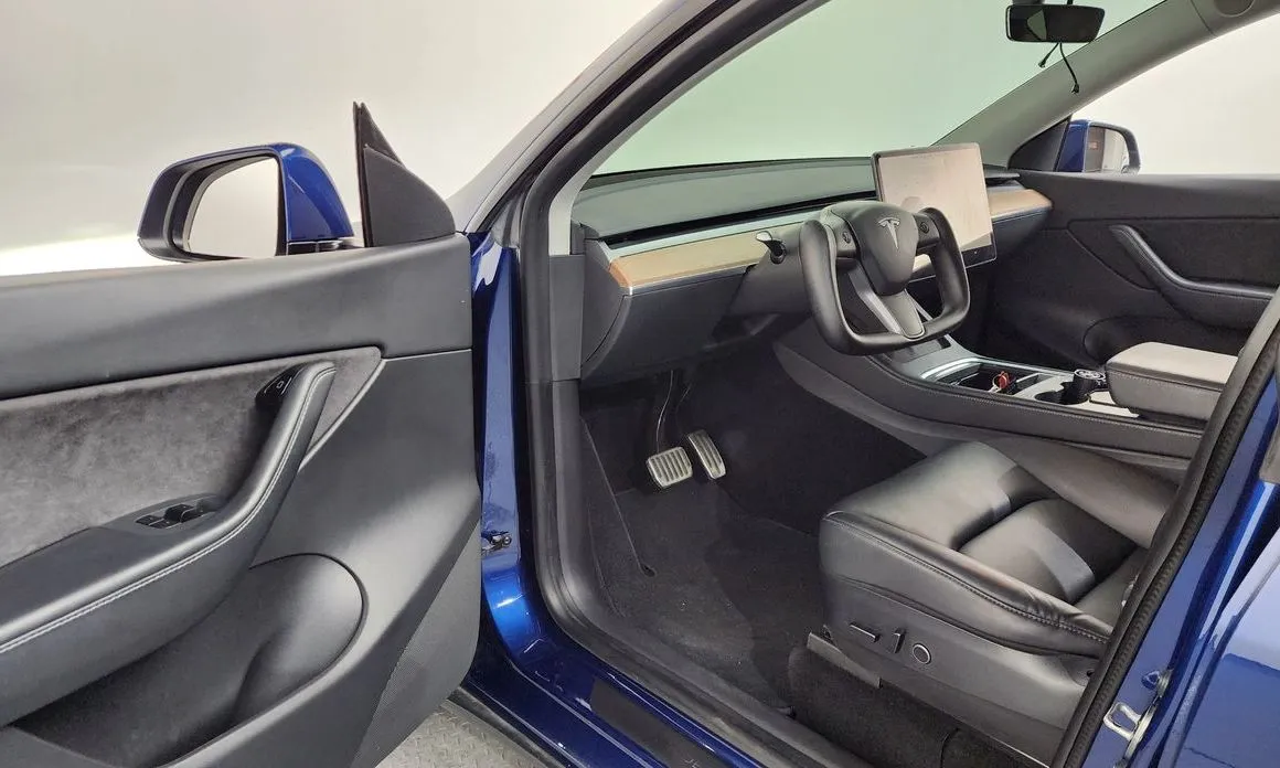 Tesla Model Y — фото 7