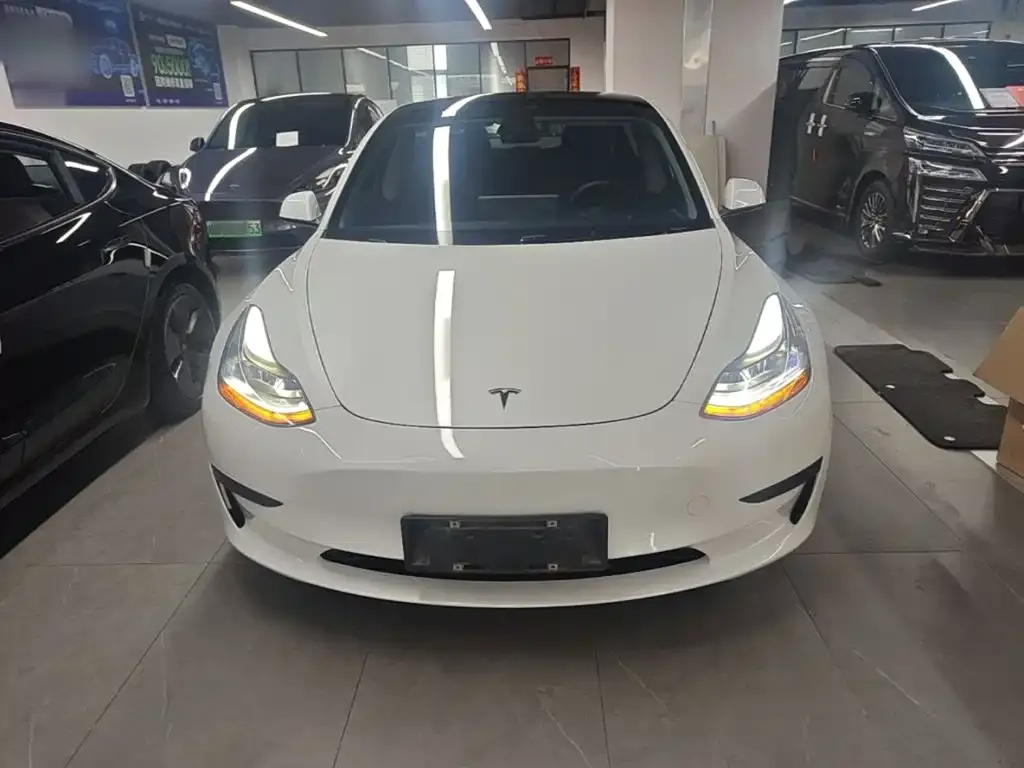 Tesla Model 3 — фото 8