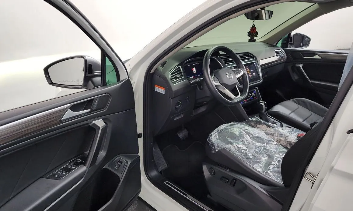 Volkswagen Tiguan — фото 4