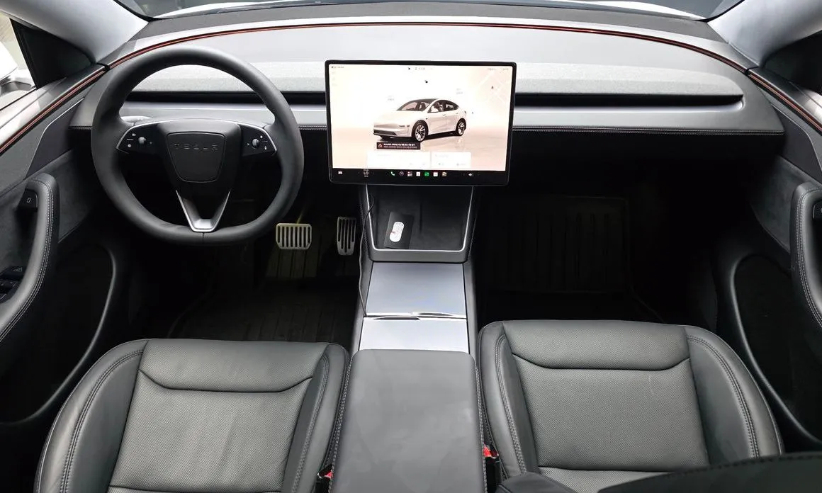 Tesla Model Y — фото 9