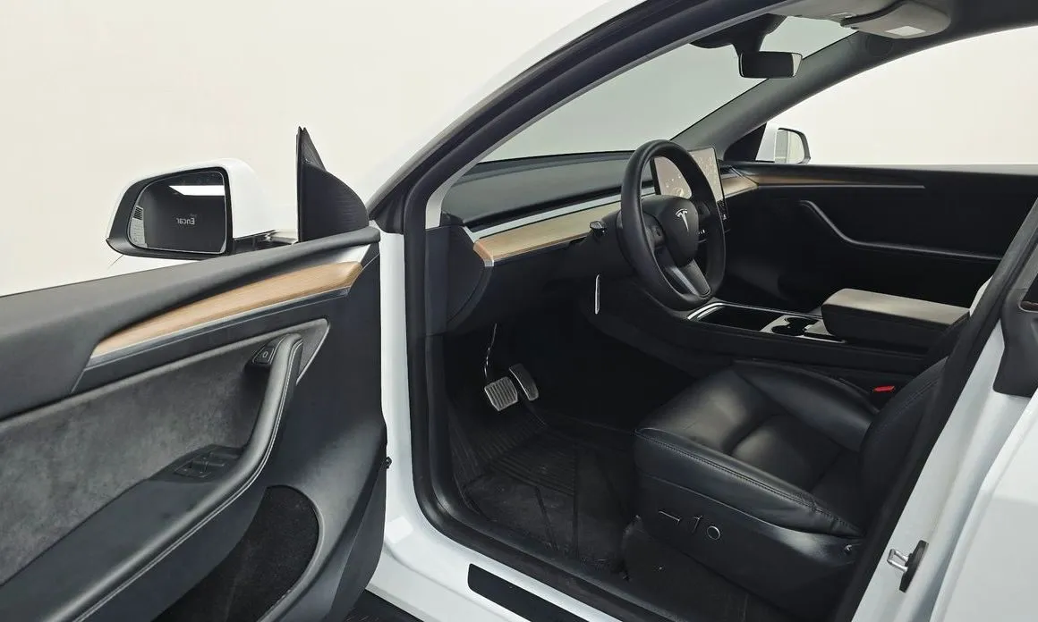 Tesla Model Y — фото 7