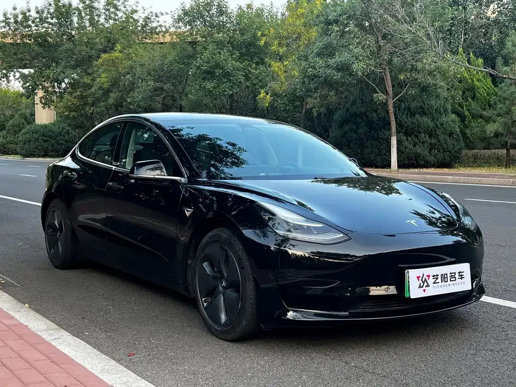 Tesla Model 3 — фото 9