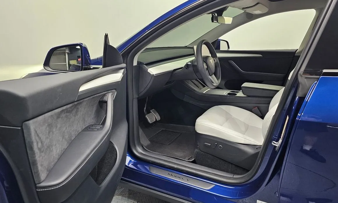 Tesla Model Y — фото 8