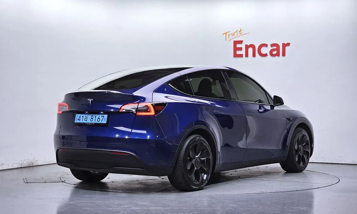Tesla Model Y — фото 5