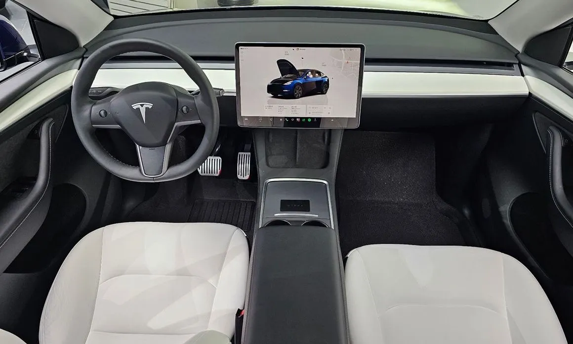 Tesla Model Y — фото 7