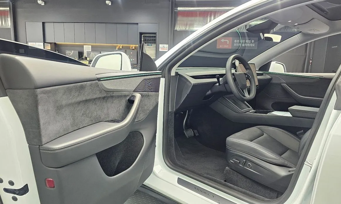 Tesla Model Y — фото 7