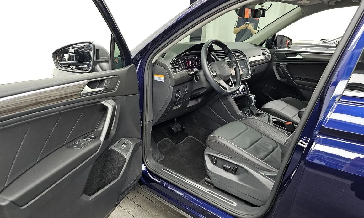 Volkswagen Tiguan — фото 10