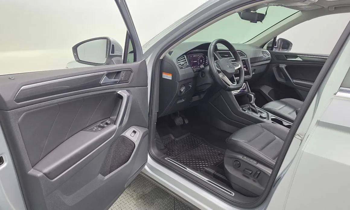 Volkswagen Tiguan — фото 8