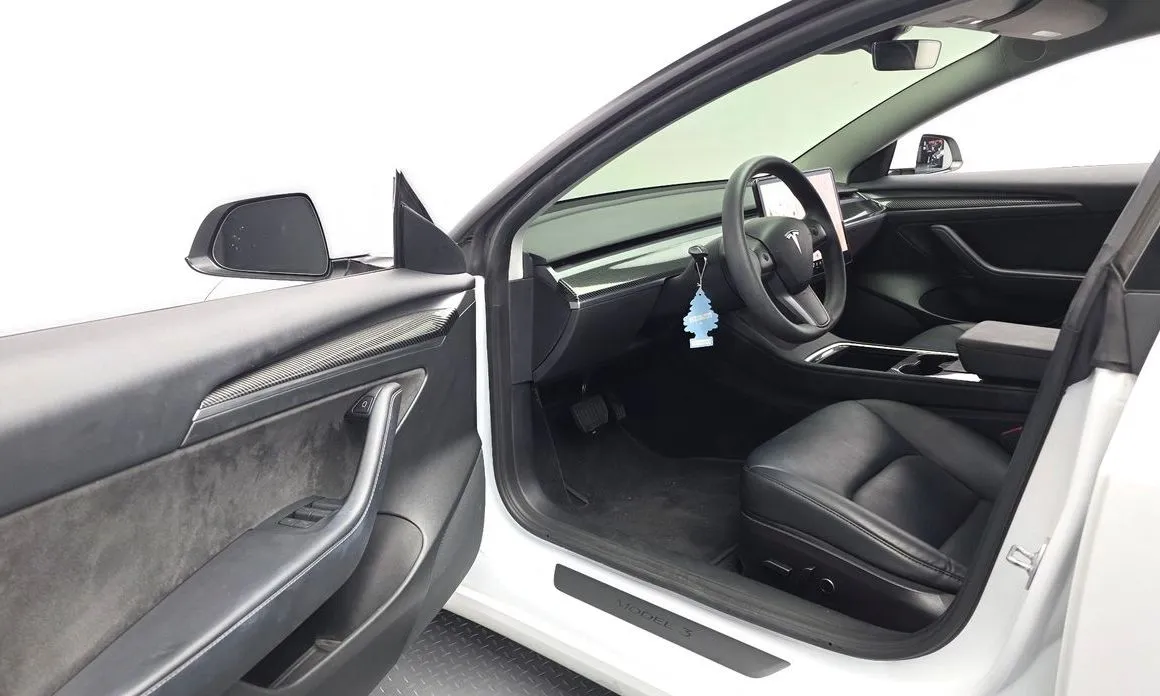 Tesla Model 3 — фото 10